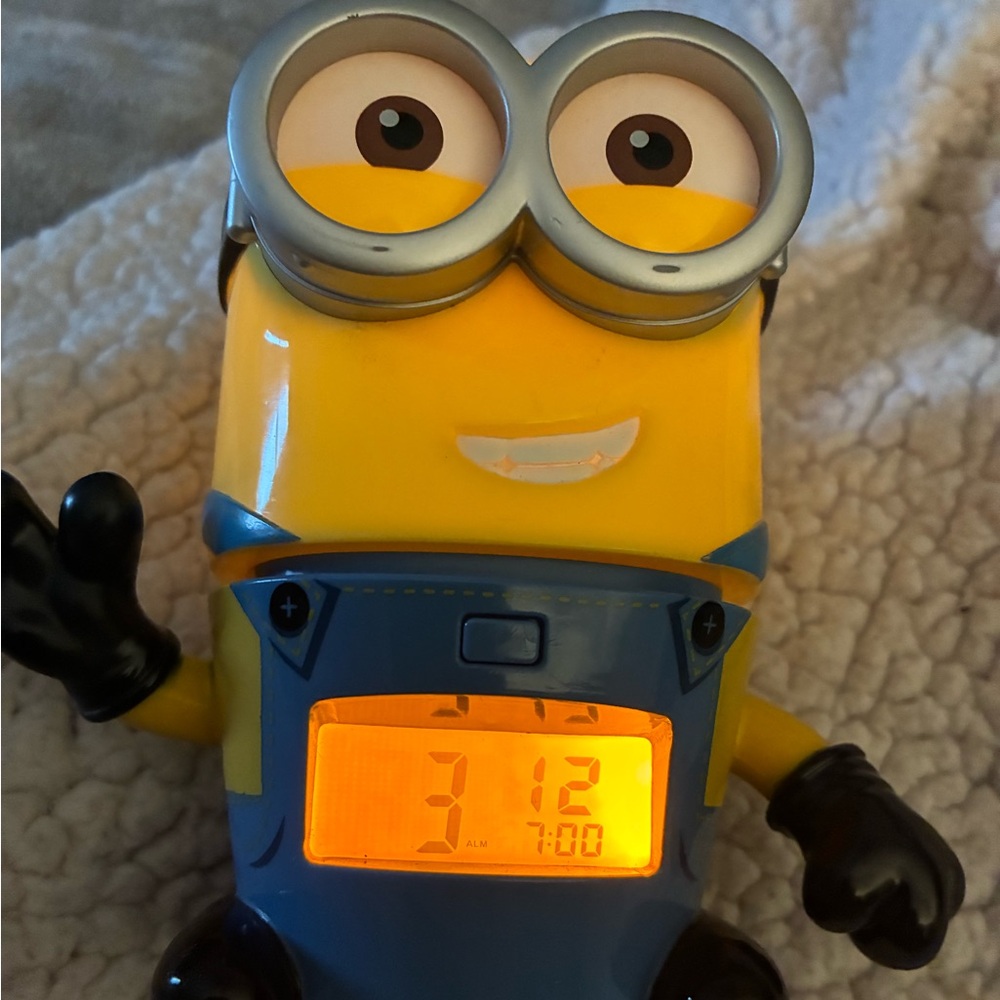 Minion alarm clock lights up and speaks “Minionese”  Despicable Me movie